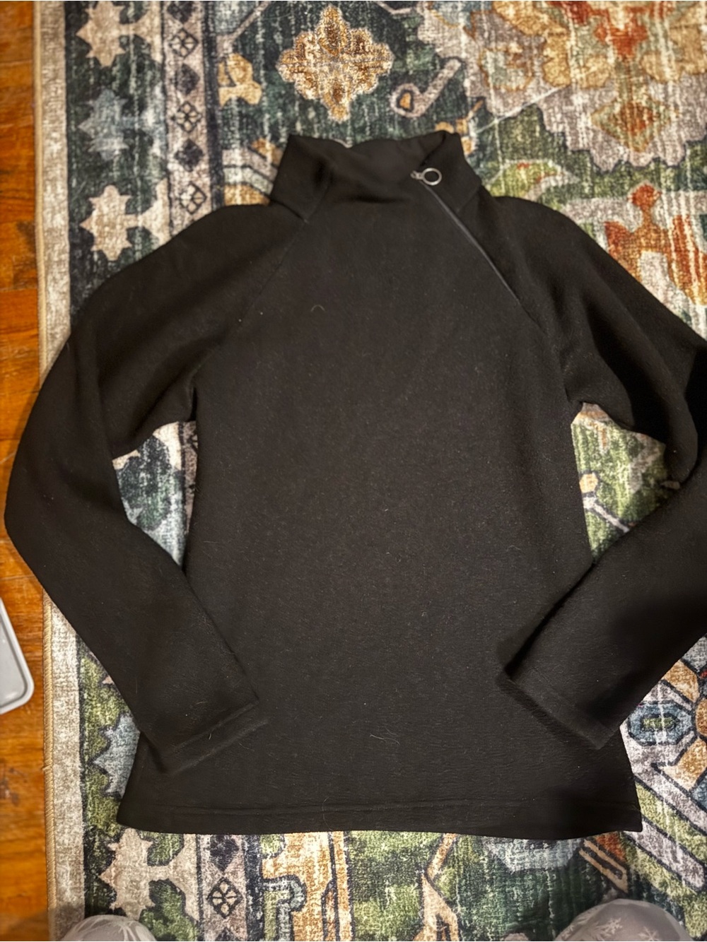 Womenโs Kuhl Black Turtleneck Sweater with Ring Detail